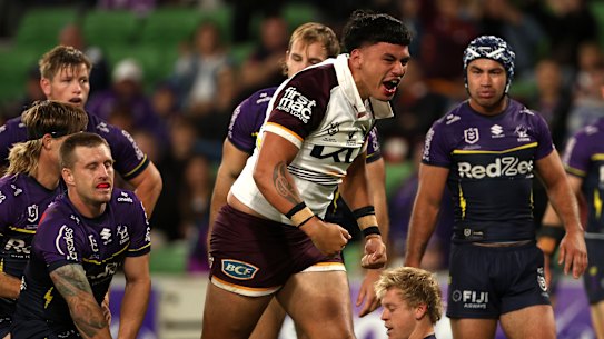 Ben Te Kura celebrates a late try against the Melbourne Storm during his Brisbane Broncos debut.