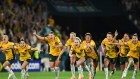 The Matildas celebrating Cortnee Vine’s matchwinning penalty against France.