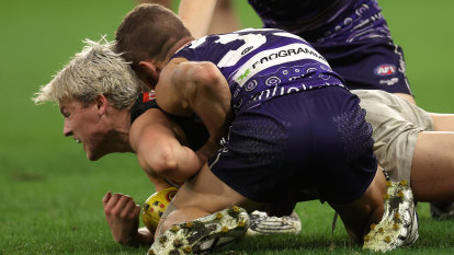 Dockers player in the soup over ‘chicken wing’ tackle