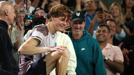 Jannik Sinner celebrates with coach Darren Cahill after the Italian’s Australian Open victory.