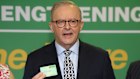 Prime Minister Anthony Albanese at his Batemans Bay press conference – and once again making use of his Medicare card.