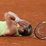 Maja Chwalinska of Poland celebrates winning match point.