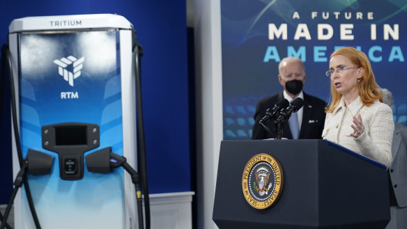 President Joe Biden listens as Tritium CEO Jane Hunter speaks about electric vehicle chargers at the White House on February 8, 2022.