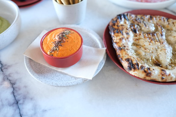 Roasted red pepper dip with flatbread.