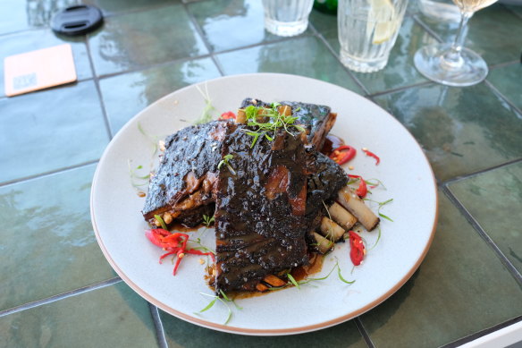 Sticky lamb ribs with hoisin sauce.