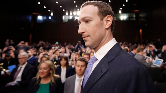 Facebook CEO Mark Zuckerberg arrives to testify before a joint hearing of Congress.