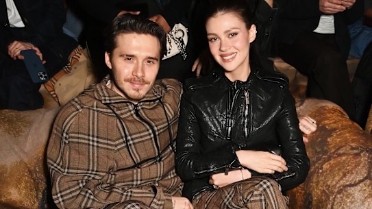 Brooklyn Beckham and Nicola Peltz at the Burberry winter 2025 show closing London Fashion Week, held at the Tate Britain.