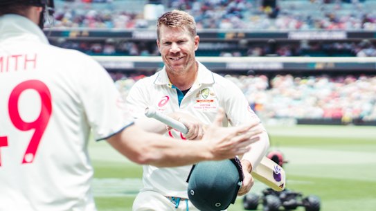 David Warner embraces Steve Smith as he leaves the Test arena for the final time.