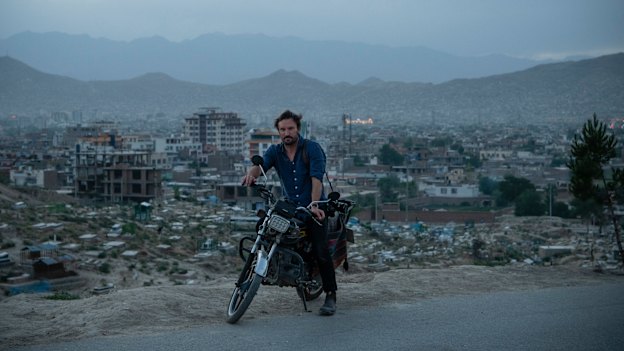 Afghanistan “became my identity”, says Andrew Quilty, pictured in front of Kabul’s Wazir Abad cemetery. 