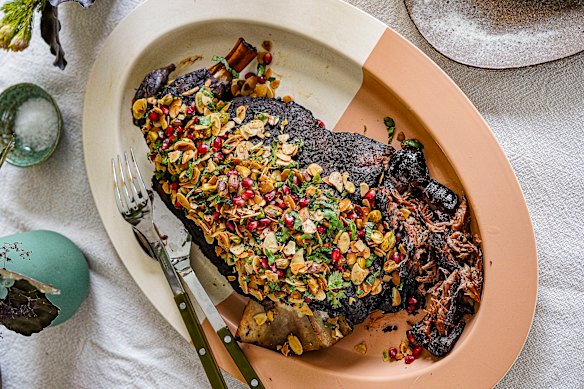 Serve slow-roasted lamb shoulder with an almond and pomegranate crust, and the rest on the side.