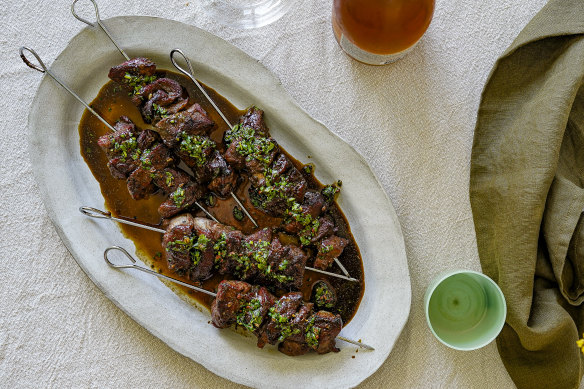 The black vinegar sauce on these Sichuan-style cumin and lamb skewers also serves as a glaze.