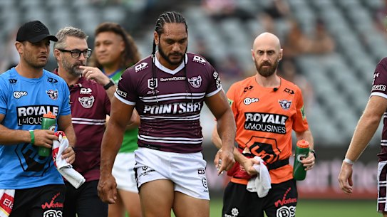 Marty Taupau lasted 90 seconds before suffering a back injury during a horror night for Manly.
