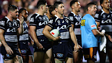 Broncos veteran Ben Hunt and his teammates during a loss.