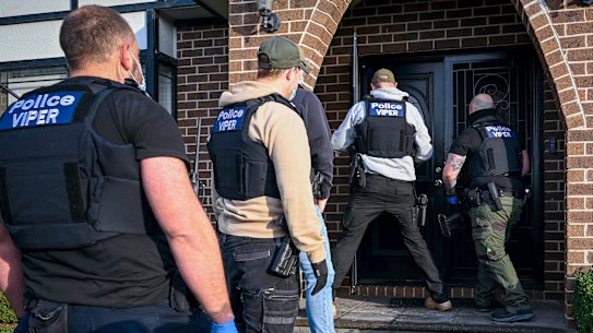 Viper officers entering a grow house in Greenvale. 