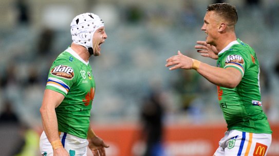 Man of the moment: Jarrod Croker, left, celebrates with Jack Wighton after  Wighton laid on his record-equalling try. 