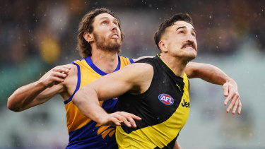Holding his own: Tiger Ivan Soldo goes up against Tom Hickey of the Eagles.