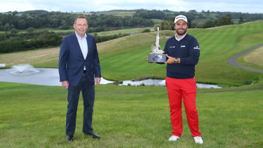 Former Australian PM Tony Abbott pictured a few days ago with French golfer Romain Langasque at the Wales Open.