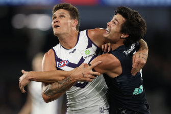 Rory Lobb and Jack Silvagni battle in the ruk.
