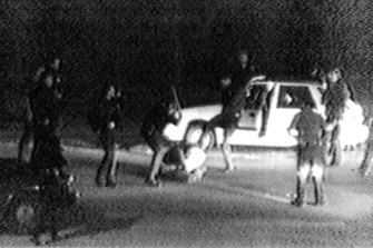 Image made from video showing police officers beating a man, later identified as Rodney King, 1991. 