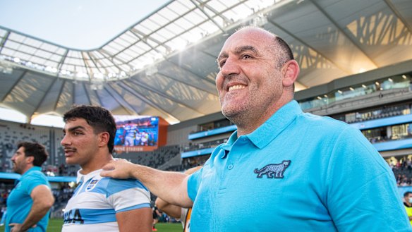 Argentina's Santiago Carreras and head coach Mario Ledesma after the Pumas' 25-15 win over New Zealand