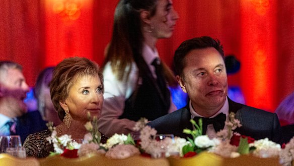 Linda McMahon, a member of Donald Trump’s transition team, and Elon Musk listen as Trump speaks during an America First Policy Institute gala at his Mar-a-Lago estate on Thursday.