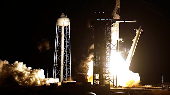 A SpaceX Falcon9 rocket, with the Crew Dragon capsule attached, lifts off from Kennedy Space Centre's Launch Complex 39-A in Cape Canaveral, Florida.