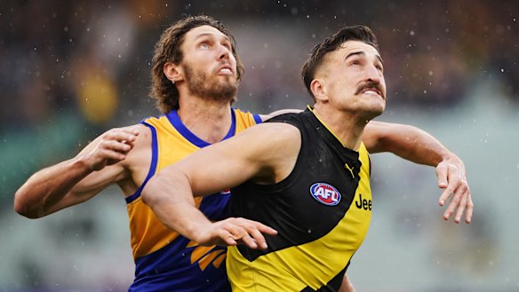 Holding his own: Tiger Ivan Soldo goes up against Tom Hickey of the Eagles.