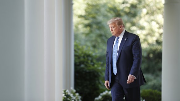 US President Donald Trump arrives at a news conference in the Rose Garden of the White House in Washington, DC. 