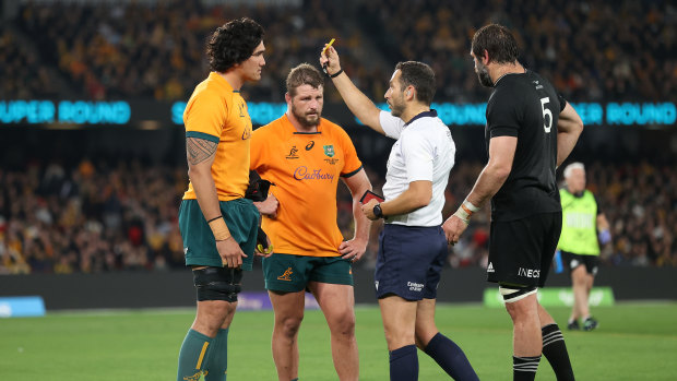 Darcy Swain is shown a yellow card for a dangerous tackle on Quinn Tupaea.