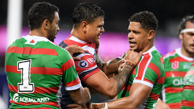 Not a grub: Sam Burgess has leapt to the defence of Roosters star Latrell Mitchell (centre).