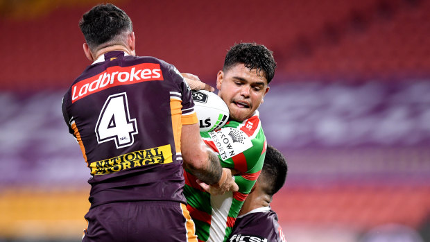 Latrell Mitchell takes on Brisbane's defence in their NRL round two clash at Suncorp Stadium.