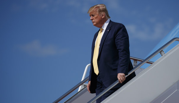 Taking a hardline approach: President Donald Trump as he arrived at Andrews Air Force Base after kicking off his re-election campaign in Florida on Wednesday.