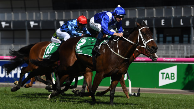Big finish: Hugh Bowman rides Winx to another victory in the Turnbull Stakes at Flemington.