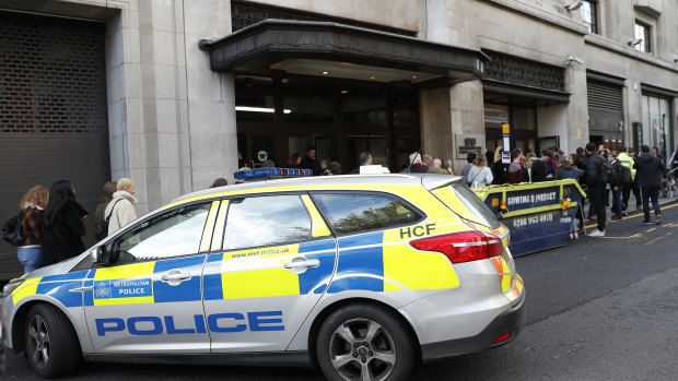 British police say two people have been stabbed and a man has been arrested at Sony Music building in London.