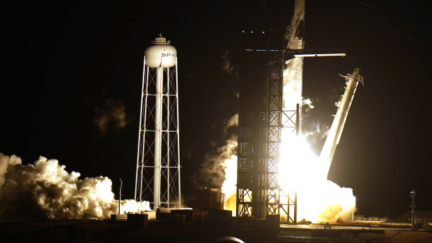 A SpaceX Falcon9 rocket, with the Crew Dragon capsule attached, lifts off from Kennedy Space Centre's Launch Complex 39-A in Cape Canaveral, Florida.