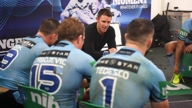 Back to earth: Brad Fittler addresses his troops in Brisbane. 
