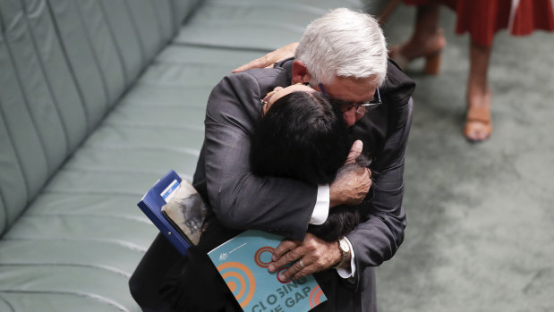 Minister for Indigenous Australians Ken Wyatt embraces Labor counterpart Linda Burney. 