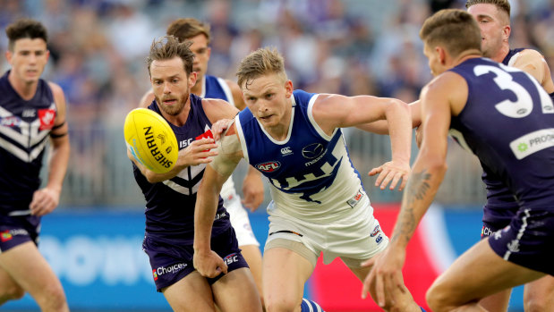 Closed out: North's Jack Ziebell attempts to break through a Fremantle pack.