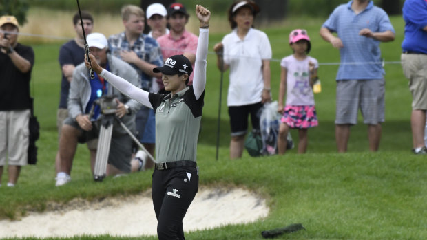 Clutch: Park Sung-hyun celebrates after her birdie putt clinches the Women's PGA Championship.