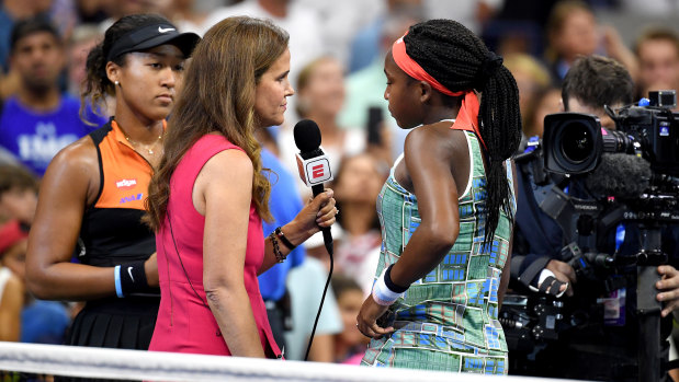 Double act: Naomi Osaka and Coco Gauff are interviewed courtside after the match.