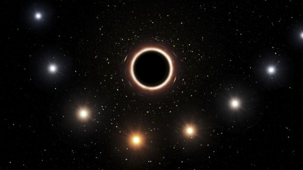 An artist's impression shows the path of the star S2 as it passes close to the supermassive black hole at the centre of the Milky Way.