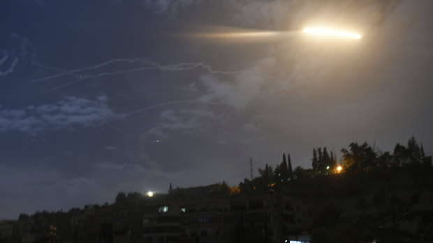 Israeli missiles fly in near the international airport in Damascus in Syria last year. Syria has again intercepted missiles it says were fired by Israel.