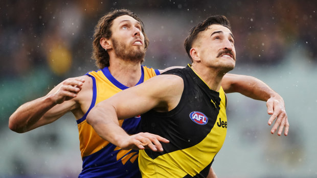 Holding his own: Tiger Ivan Soldo goes up against Tom Hickey of the Eagles.