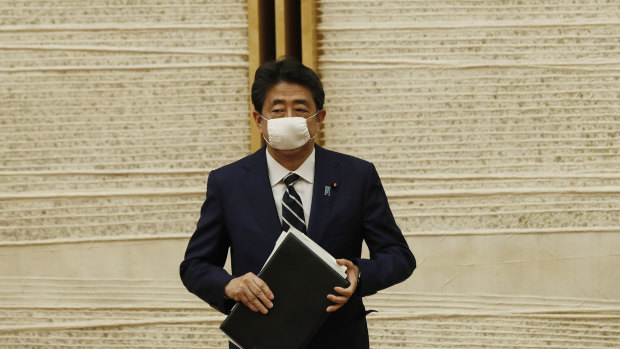 "I will defend the Japanese economy at any cost against this once-in-a-century crisis," Shinzo Abe said.