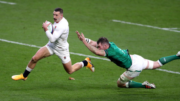 Jonny May outstrips Peter O'Mahony for his length-of-the-field try on Saturday.