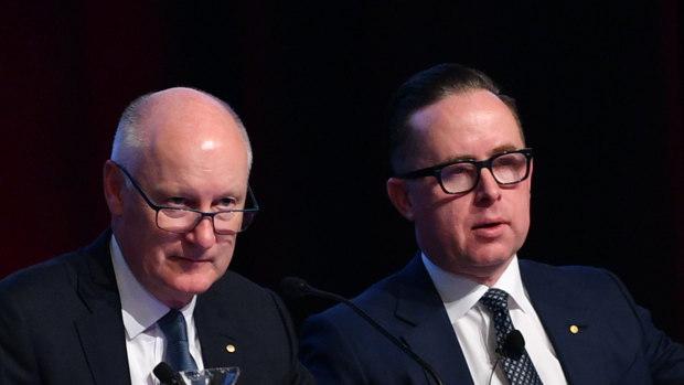 Qantas chairman Richard Goyder (left) and CEO Alan Joyce stared down human rights activists at its AGM on Friday. 