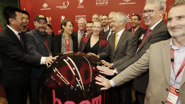Then Prime Minister Malcolm Turnbull touches the Ideas Boom ball with Australian tech start ups at a launch in Shanghai in April 2016.