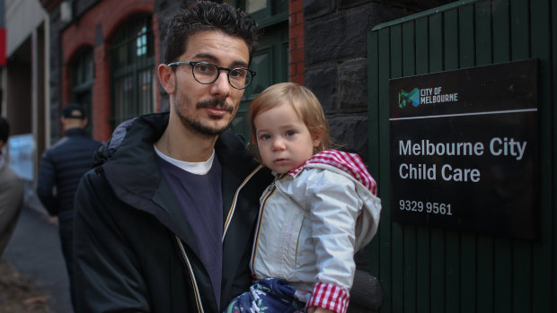 Daniel Vigilante with his daughter Gia outside the childcare centre in A'Beckett Street.