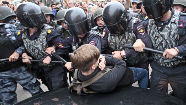 A government plan to increase the age for collecting state pensions brought protests across Russia's 11 time zones on Sunday. Nearly 300 people were reported arrested.