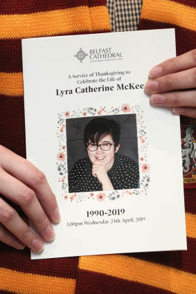 A mourner holds the order of service from Lyra McKee's funeral in Belfast.